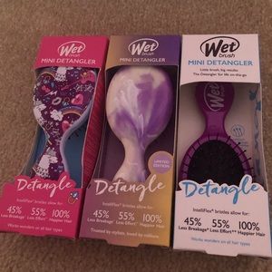 Three purple wet brushes